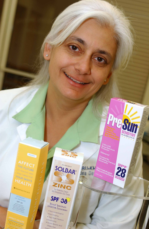 Dermatologist Nasreen <b>Babu-Khan</b> displays sunblocks containing titanium ... - babukhan_1