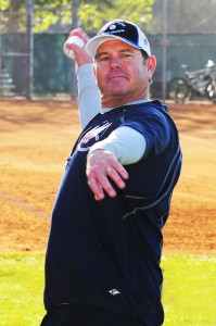 Longtime coach Rick McGeagh tosses the ceremonial first pitch to officially open the PPBA season. Rich Schmitt/Staff Photographer  