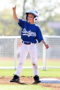 Jensen Bell of the Pinto Dodgers celebrates reaching second base. Rich Schmitt/Staff Photographer  