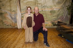 Junior Reporter, Claudia, in her role as Seaman the Dog, pictured with teacher and playwright Jeff Lantos. Photo: Nicola Buck
