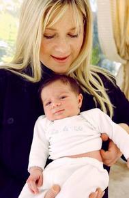 First Baby of 2004: Cody Robert Michaels, appearing here with his mother Pam, is the First  Baby of 2004 in Pacific Palisades.