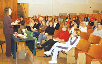 Marlene Canter, president of the L.A. school board, explains to an audience of about 50 parents at a recent PRIDE meeting at Paul Revere why they should back Measure Y in the November election.