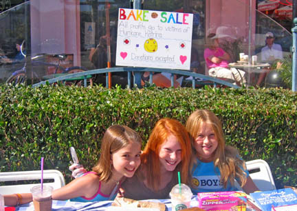 From left, Romi Messer, Annie Steele and Lena Kane organized a bake sale over the Labor Day weekend to raise money for hurricane victims.