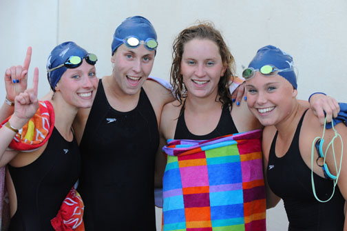 Seniors (L-R) Hayley Lemoine, Shelby Pascoe, Hayley Hacker  and Anna Silka placed second in the 400 freestyle relay, earning the points that clinched the City Championship.