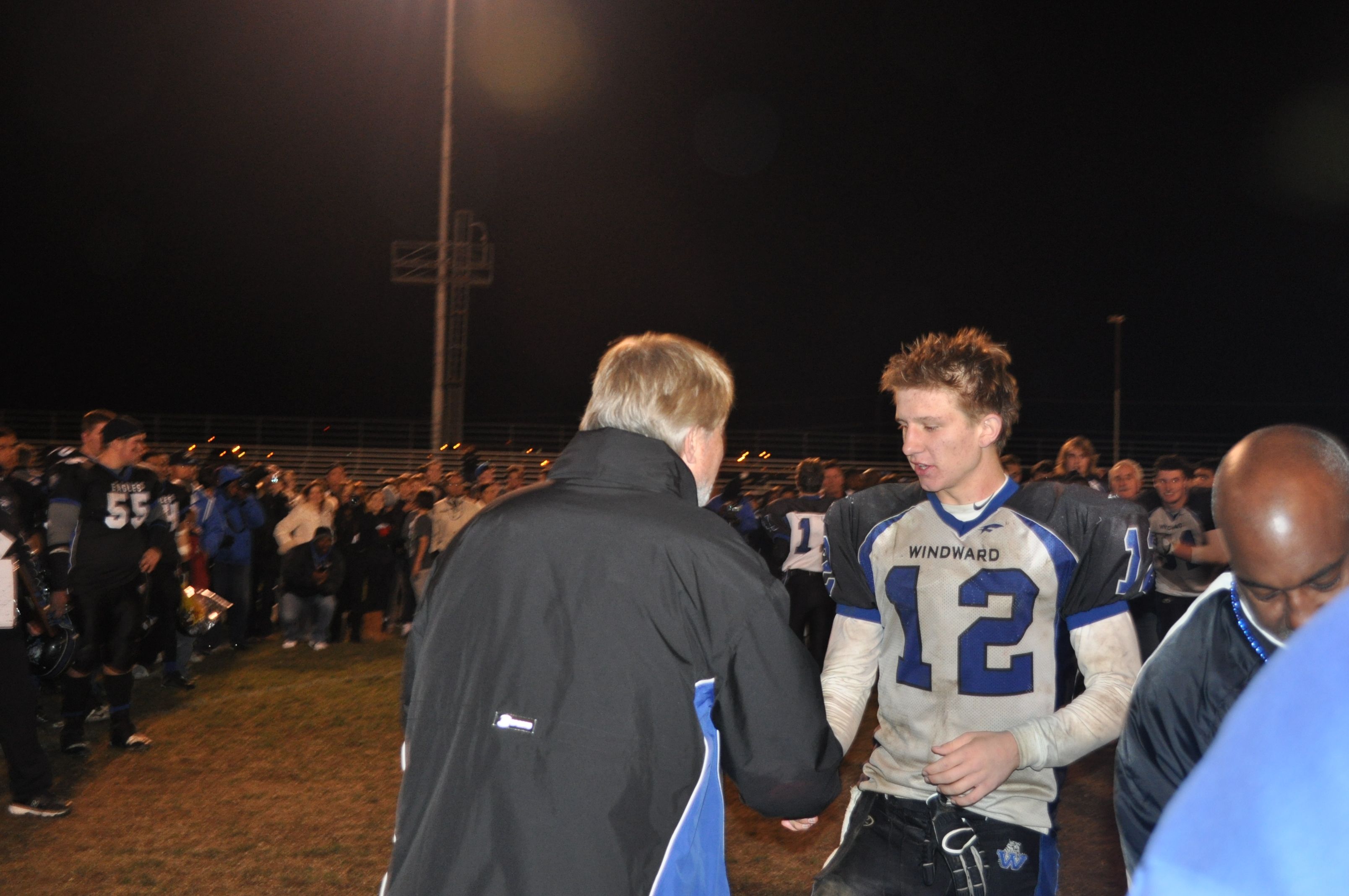 Sam Hake receives congratulations at the trophy presentation after leading Windward to the Southern Section Division I 8-Man football championship.