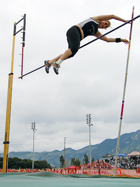 Camille Liberatore clears the bar 10 feet from the ground on her way to winning the pole vault last Thursday in the City Track and Field Finals at Birmingham High. Photo: Gabe Lee