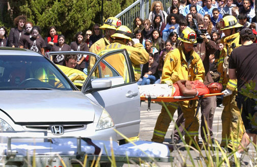 Firefighters from Station 69 participated in the Every 15 Minutes program at Palisades High School, where students view the realistic aftermath of a 