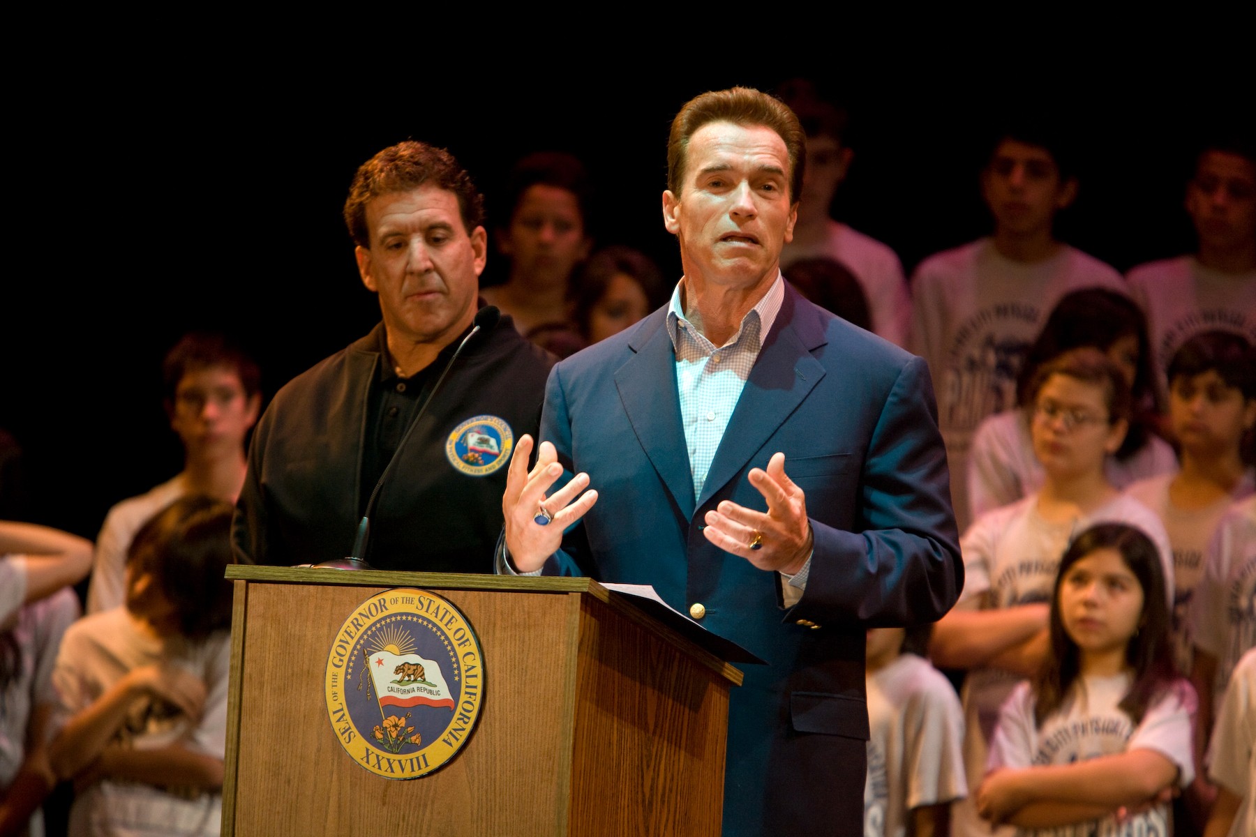 Governor Arnold Schwarzenegger announces the Challenge Competition as Palisades fitness guru Jake Steinfeld looks on. Photo: Duncan McIntosh, Office of Governor Schwarzenegger