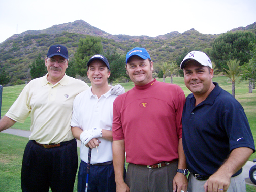 (Right to left) Palisadian Jim Buerge, Wink Winkenhower, Dylan Colby and Steve Kirsh wait to tee off at last year's Buerge Charity Golf Tournament in Malibu.