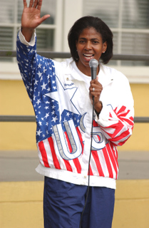 Former Olympian Kym Begel addresses her young audience at Palisades Elementary School's annual Olympics Day.