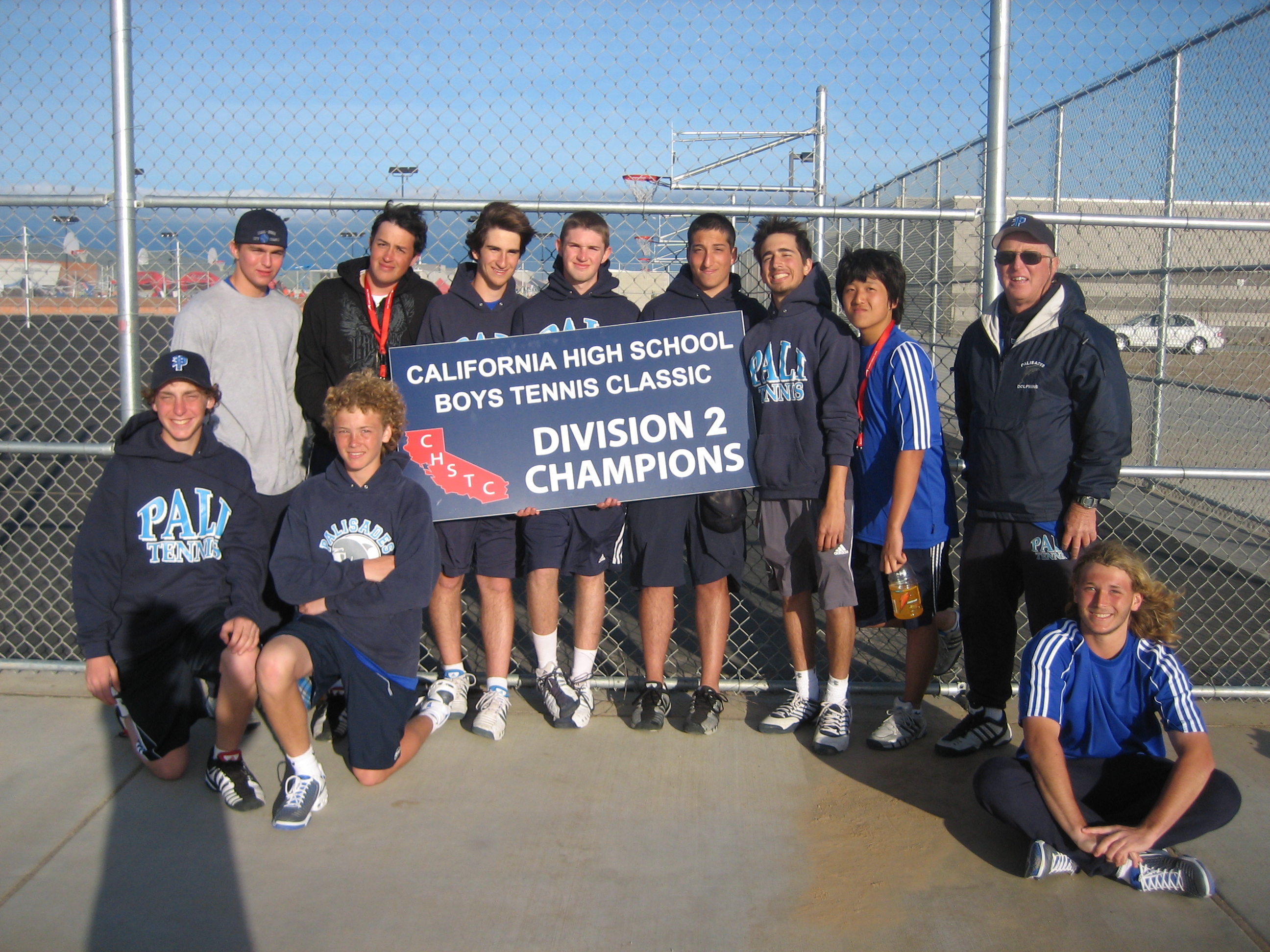 Palisades team members with the winners' plaque from the California Tennis Classic in Fresno. Photo by Bud Kling