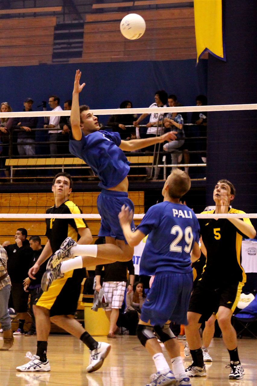 Jordan Cohen spikes the ball against San Luis Obispo Saturday at the Dos Pueblos Invitational. Palisades reached the semifinals of the Bronze Division. Photo: Chuck Cohen