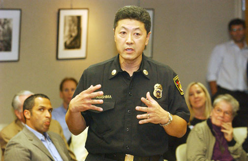 Battalion Nine Chief Glenn Miyagishima answered questions about the reduction in fire services at the Pacific Palisades Community Council meeting last Thursday.