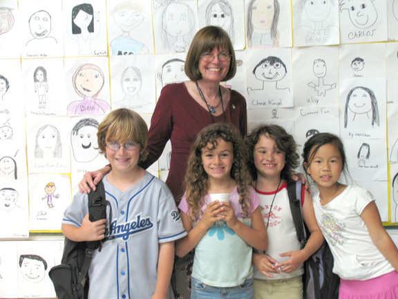 Pictured with retiring teacher Joyce Landsverk are (left to right) 5th grader Jeremy Alexander, 2nd grader Caitlin Fernandez, 4th grader Deanna Ter Veer and 2nd grader Jiaxi Chen. Photo: Debbie Alexander
