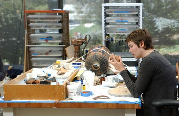 Getty intern Teresa Navarro is working on this 4th-century B.C. Italian vase in the Conservation laboratory at the Getty Villa. Navarro holds degrees in Conservation studies and fine arts. Photo: Rich Schmitt/Staff Photographer