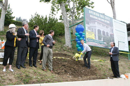 (Left to right) Calvary Head of School Teresa Roberson, Mike Van Konynenburg (incoming board chair), Robert Peddicord (outgoing board chair), Mark Holscher (vice chair CCS Foundation), Leslie Clark (director of marketing), and Tom Villante (chair CCS Foundation) watch project coordinator Tony Ramsey break ground for the Arts and Technology Center. Right of Ramsey is Calvary Church senior pastor Steve Faubion. Rich Schmitt/Staff Photographer