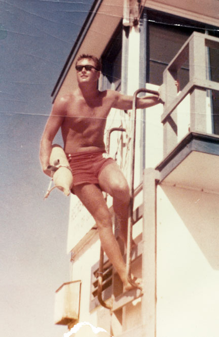 In this 1953 photograph, Los Angeles City lifeguard Dick Orr is ready to make a rescue. A lifeguard for over 50 years, Orr was also a teacher and played professional football for two seasons with the Baltimore Colts. Photo, courtesy Arcadia Publishing