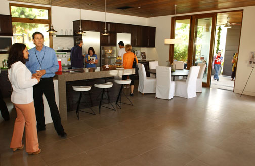 The spacious kitchen in the VISION House features Energy Star-certified appliances and leads to a patio with a built-in barbecue.      Rich Schmitt/Staff Photographer