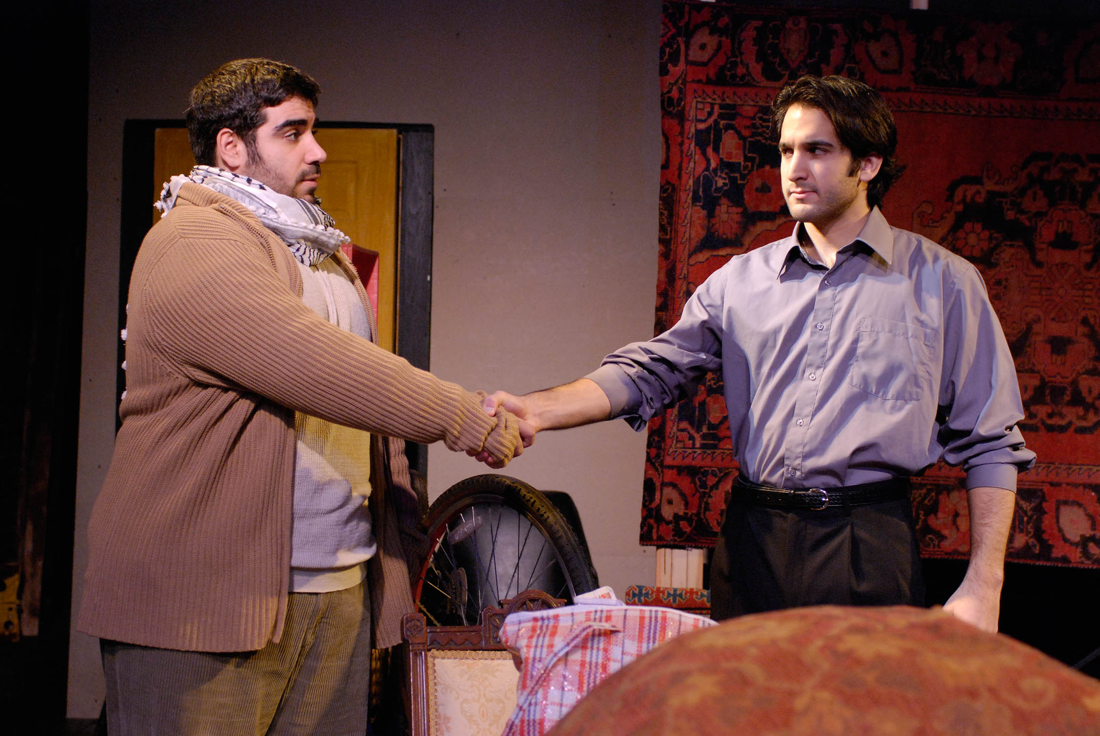 Mike Mosallam (as Aziz) and Jeremy Cohen (Assaf) play a Palestinian and Israeli forced to co-habit in Malibu Stage Company's 