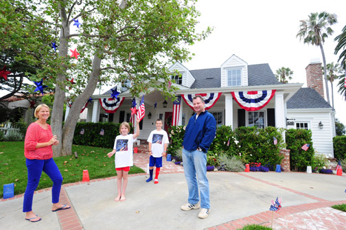 Jackie, Kate, Jack and Jim Hassett in front of their home on DePauw, which captured this year's Fourth of July Home Decorating Contest, sponsored by realtor Joan Sather and presented by the Palisades Americanism Parade Association. Rich Schmitt/Staff Photographer