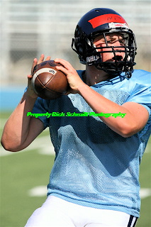 Quarterback Branden Sanett drops back to throwe during practice last week. The Dolphins scrimmage Kilpatrick on Friday at Stadium by the Sea.