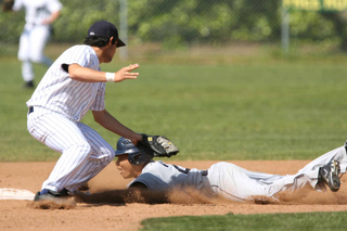 David Skolnik tags out a runner at second base in the first inning of Monday's 4-0 victory over Venice at George Robert Field.