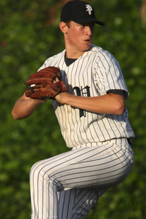 Varsity starting pitcher Jon Moscot kept the alumni in check until Palisades'  offense ignited in the late innings.
