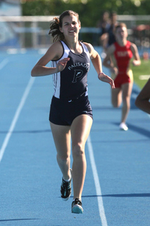 Lauren Gustafson blazes to victory in the 400 meters last Friday at Stadium by the Sea.