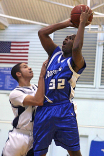 Aaron Fitts shoots a jumper on his way to a game-high 17 points in Palisades' 75-47 Western League victory at Venice.