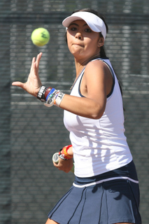 Sophomore Jessie Corneli lines up a forehand during Palisades' intersectional tennis match at Beverly Hills last Thursday.