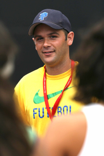 Sean Passan is the new girls tennis coach at Palisades High and will try to guide the Dolphins to their fourth straight City title.