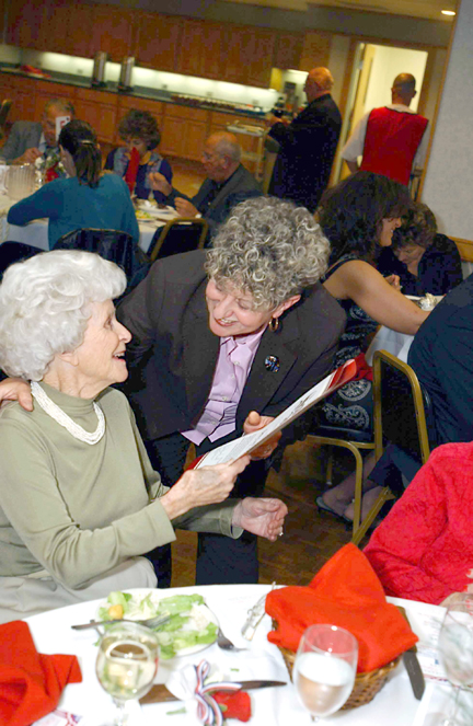 Betty Lou Young received a Community Treasure Award from the Palisadian-Post in recognition of her vital role as the author of numerous books involving the history of Pacific Palisades. She is congratulated here by Laurie Newman, a deputy for State Senator Sheila Kuehl.