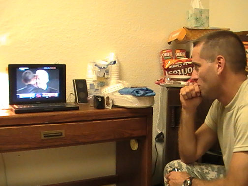 Beau Biden watches from his room in the barracks at Ft. Bliss, Texas, Tuesday night as his father Joe joins President-Elect Barack Obama on stage in Chicago.  Photo: Rev. Edward Brandt