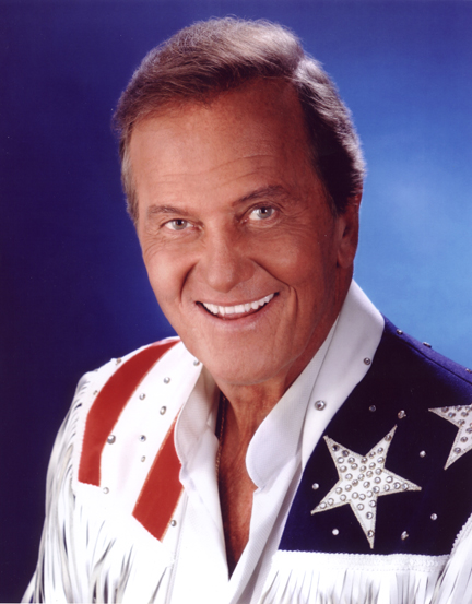 Pat Boone decked out in his red, white and blue Western rodeo outfit, which he plans to wear as Grand Marshal at the Palisades Fourth of July parade.