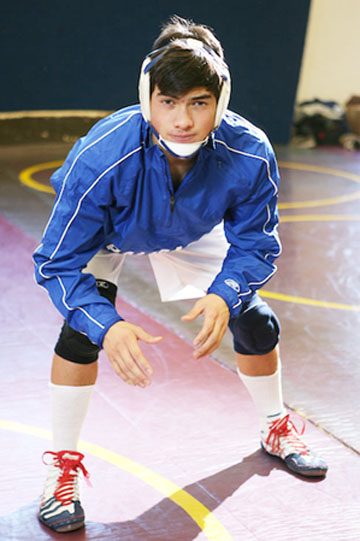 Sophomore Brad Boorstin has exceled on the wrestling mat and the football field.	Rich Schmitt/Staff Photographer