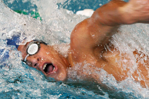 Sophomore Michael Lukasiak combined with three of his teammates to help the Dolphins win the 400-yard freestyle relay at East L.A. College. Rich Schmitt/Staff Photographer