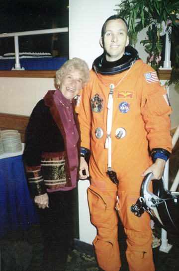 Pacific Palisades resident Gabrielle Bresnik poses next to a cardboard cutout of her step-grandson, astronaut Randy Bresnik, at Kennedy Space Center in Florida before his shuttle launched on November 16. Bresnik was not able to say good-bye to Randy because he was in quarantine for several days. Randy's wife, Rebecca; his father, Randy Sr., and stepmother, Ruth, were the only ones allowed to visit him.