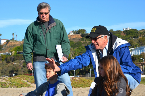 Palisadians Stephen Messer (back left) and Peter Smokler set the scene for young stars Jonathan Morgan Heit and Ryan Newman for the filming of 