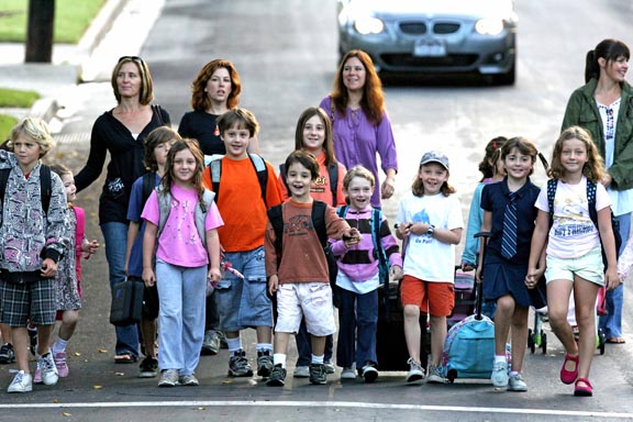 In a crosswalk, these Palisades Elementary students and their moms are part of a 