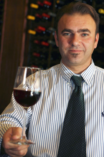Casa Nostra Ristorante partner/manager Giovanni Zappone toasts the success of his new Highlands restaurant.