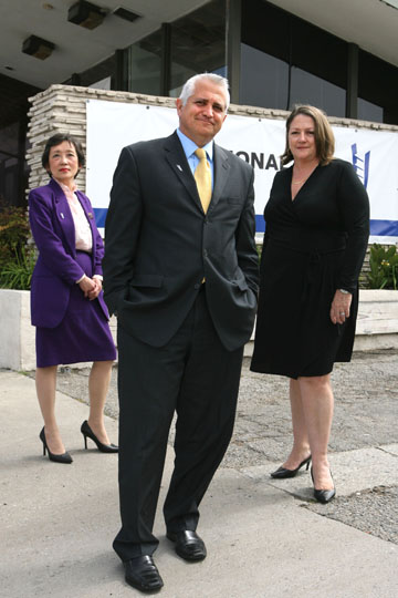 Branch manager Bob Martinez and staff members Mary Wong (left) and Lynne Pizzia.    Rich Schmitt/Staff Photographer