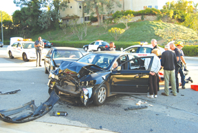 A two-car collision in the Palisades Highlands Monday afternoon sent two people to Santa Monica Hospital with minor injuries, including this 96-year-old driver. Photo: Joyce Simmons