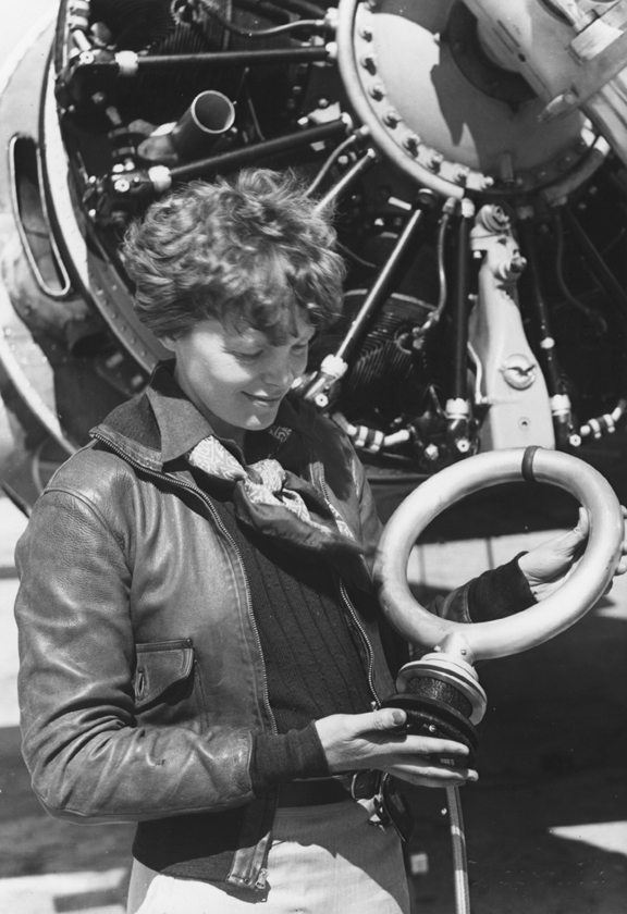 Aviator Amelia Earhart holds a directional finder before her attempt to circumnavigate the equator in 1937. Photographer Albert L. Bresnik, a Pacific Palisades resident who died in 1993, was Earhart's personal photographer from 1932 until her disappearance in 1937.