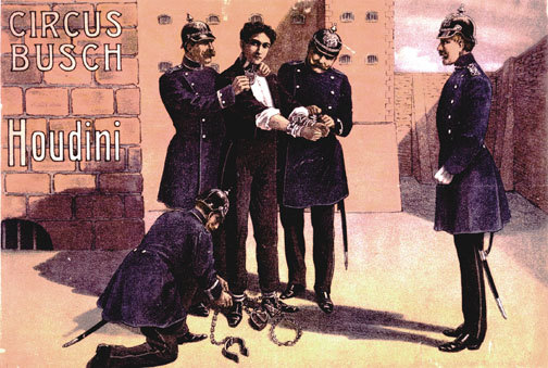 Houdini and the Circus Busch, 1908, depicting four police officers (dressed in military garb) surrounding him, three of them securing his neck, wrist and ankles in hefty cuffs. Photo: Library of Congress, Rare Book and Special Collections.