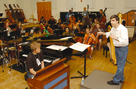 Palisadian Vince Mendoza conducts a rehearsal with the Henry Mancini Institute chamber orchestra.