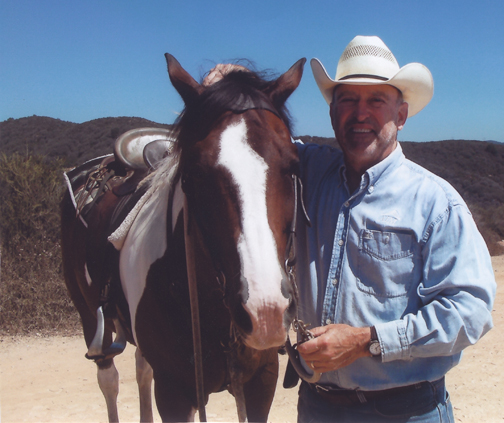 Lester Wood with his horse Scout, which he sold to a local couple after the accident, knowing that rehabilitation would prevent him from exercising Scout.