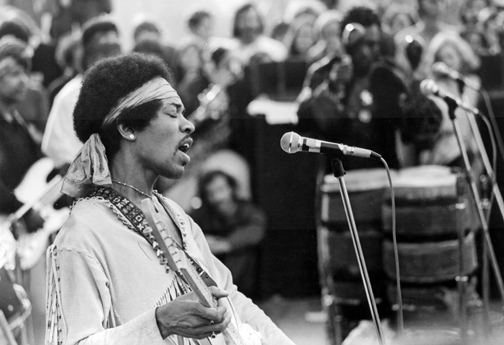 Jimi Hendrix, photographed by Bart Bartholomew.  On Wednesday morning, August 13, 1969, Bartholomew and his brother Buzz drove up to the Woodstock Festival at Max Yasgur's 600-acre dairy farm. They were immediately put to work building fences and the stage for the three-day event that hosted 32 acts and eventually drew some 500,000 concertgoers. 