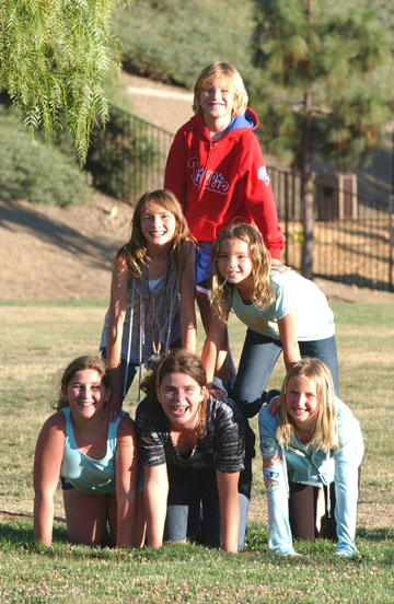 Celebrating a Park: Six kids formed this pyramid during a celebration party at the Palisades Drive Recreation Association's park in the Highlands on Friday evening, August 20. Tyler Duffy is at the top of the pyramid, Kaitlynne Henney (left) and Amelia Koblentz (a friend of Natalie Williams) are in the middle and Jackie Sannett, Emma Waring and Carly Duffy form the bottom row.