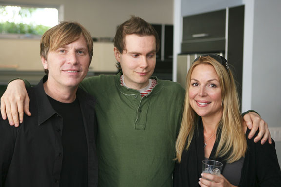 Jon Por Birgisson of Sigur Ros (center) is flanked by hosts Scott Hackwith and Lanette Phillips, who opened up their home for an Icelandic music event organized by Anna Hildur (not pictured).