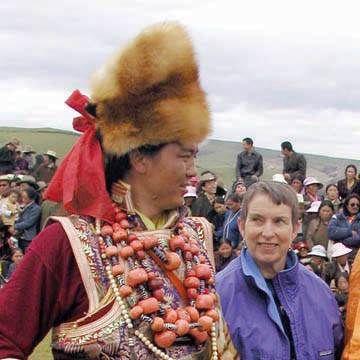 Author Harriet Wyre poses with Litang chieftain in Tibetan Szechuan.